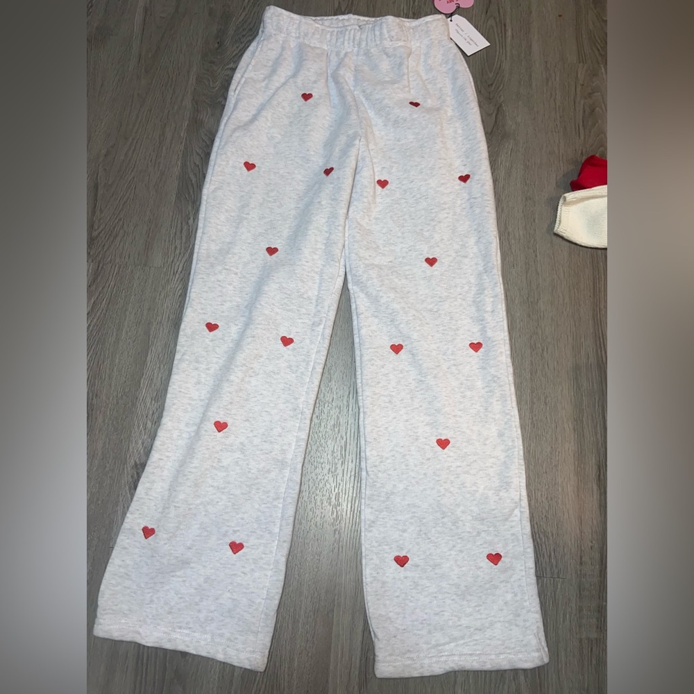 Gray Sweatpants With Red Heart Pattern - image 1